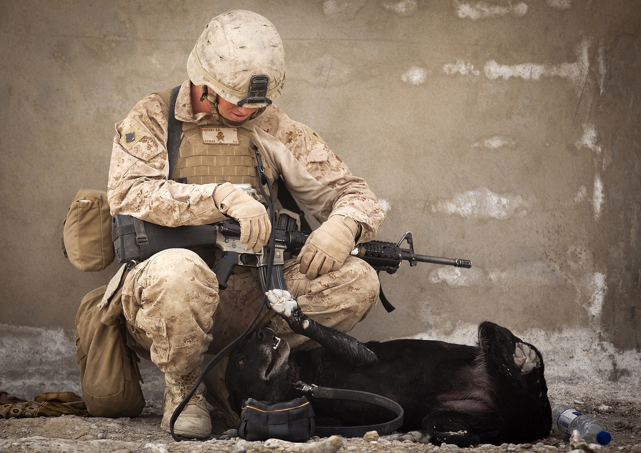 Sleeping soldier in a sitting position