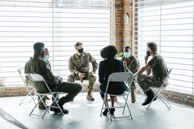soldiers meeting in a military office